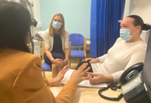 Henrietta sitting in on a patients appointment